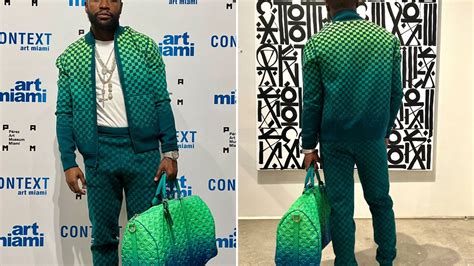 50 cent floyd mayweather louis vuitton|50 Cent Turns Floyd Mayweather Into His Duffel Bag in Latest .